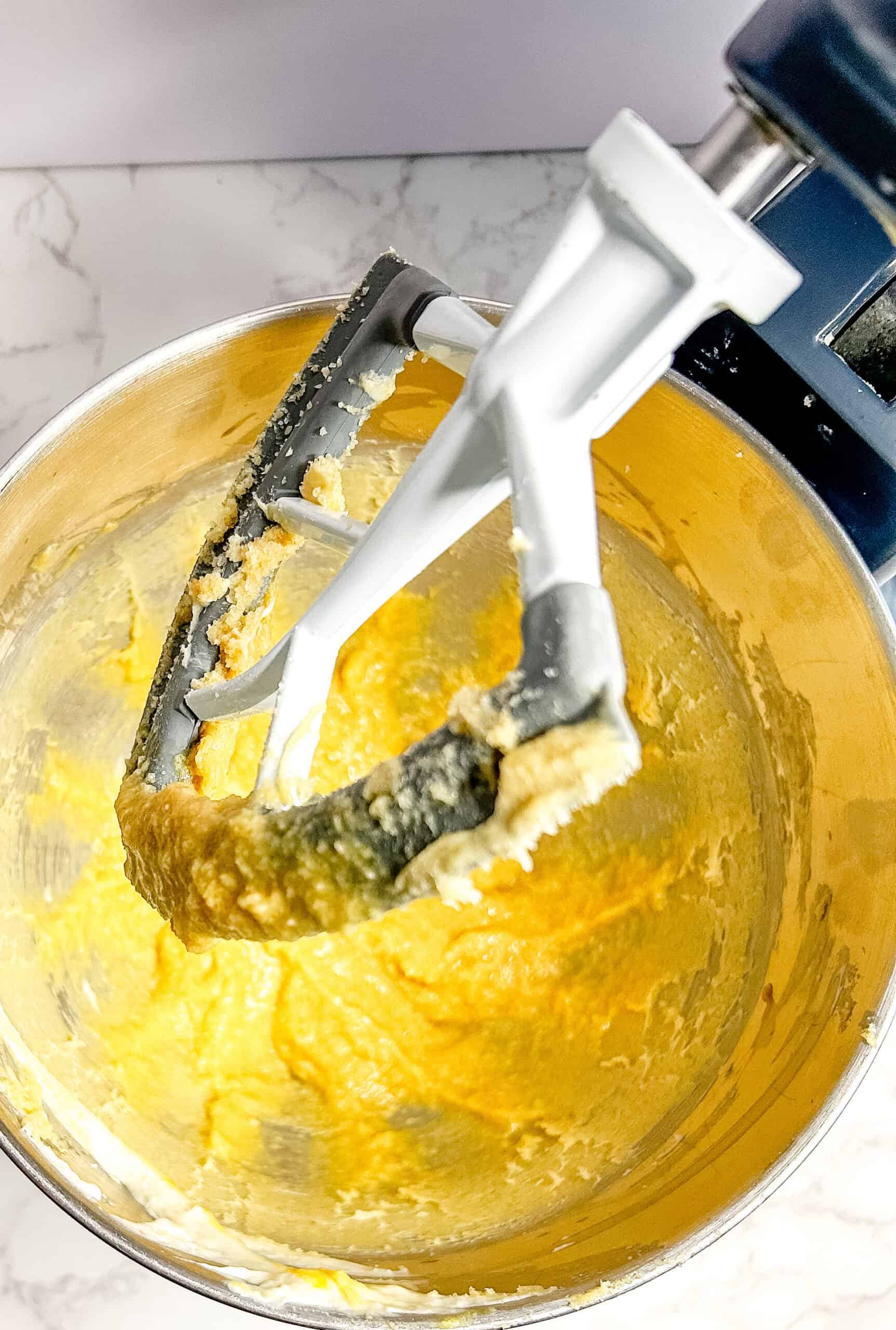 Wet ingredients added to the butter and sugars and mixed together